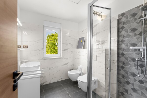 Foto van Villa in Istrië met verwarmd zwembad - Vakantiehuis in Brtonigla - BathRoom