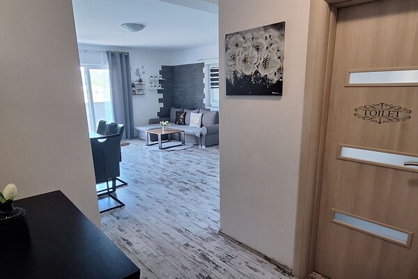 Foto van Belisima Delux - One Bedroom Apartment With Sea View - LivingRoom