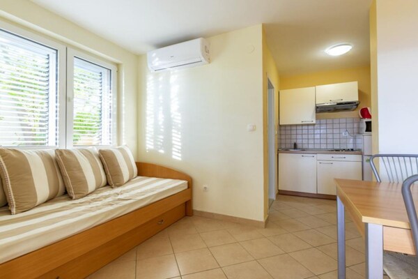 Foto van Classic One Bedroom Apartment with Sea View and Terrace - LivingRoom