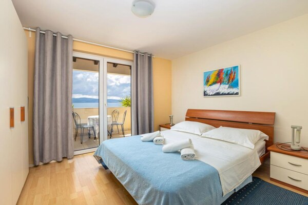 Foto van Classic One Bedroom Apartment with Sea View and Terrace - BedRoom