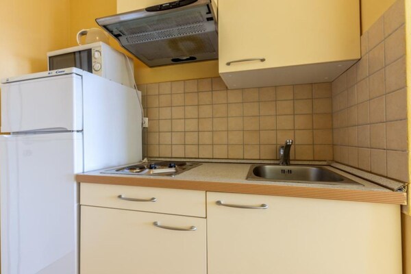 Foto van Comfort One Bedroom Apartment with Sea View and Terrace - Kitchen