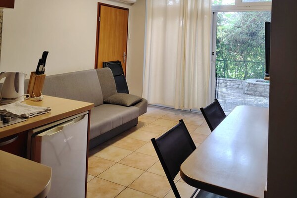 Foto van Comfort Kostrena Apartments Rijeka - One bedroom apartment with terrace (8) - LivingRoom