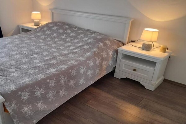 Foto van Comfort Apartments Lumbarda - TwoBedroom Apartment With SeaView - BedRoom