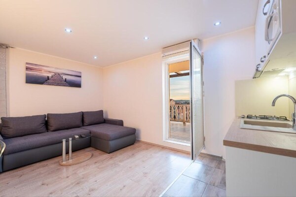 Foto van Bračić Premium Apartments with Outdoor Pool and Sauna - Superior Two Bedroom Apartment with Terrace - LivingRoom