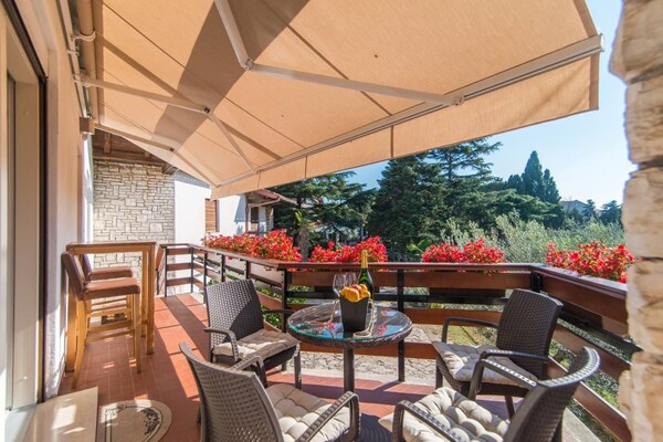 Foto van Appartement in Medulin met Zeezicht en Strand - Vakantiehuis in Medulin - TerraceBalcony