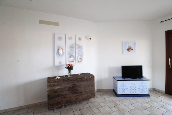 Foto van Appartement voor 6 personen, Cannigione - Vakantiehuis in Arzachena - LivingRoom