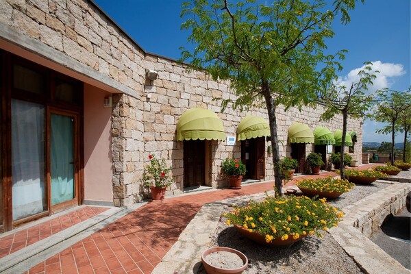 Foto van Appartement in Cannigione di Arzachena, Sardinië - Vakantiehuis in Cannigione di Arzachena - ExteriorSummer