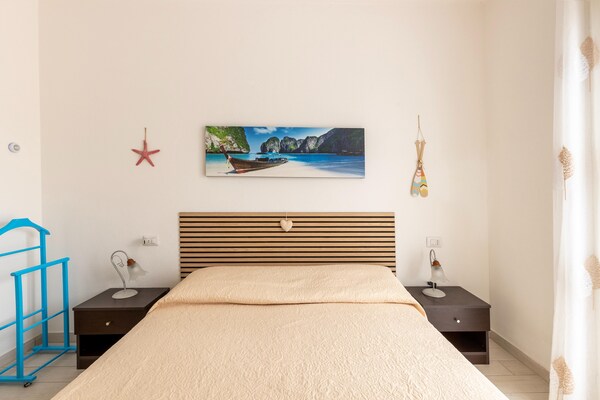Foto van Zwembad condivisa en giardino privato - Vakantiehuis in Badesi - BedRoom