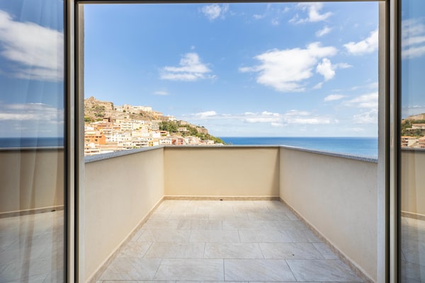 Foto van Appartement met vista mare en terrazza - Vakantiehuis in Castelsardo - TerraceBalcony