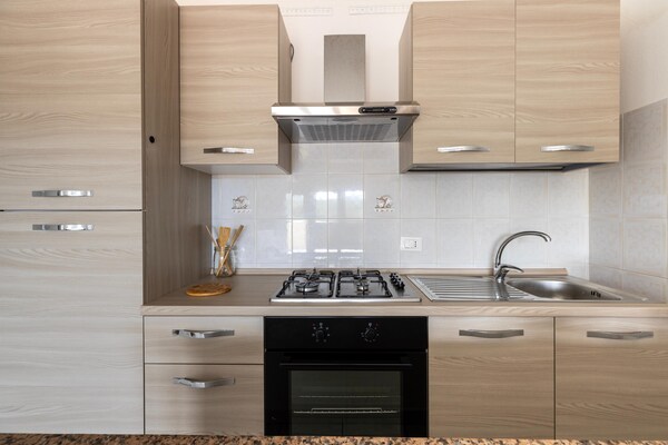 Foto van Appartement met airconditioning en terras - Vakantiehuis in Castelsardo - Kitchen