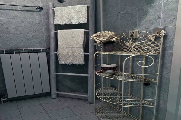 Foto van Appartement met tuinzicht in Sanremo met veranda - Vakantiehuis in Sanremo - BathRoom