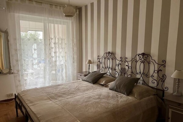 Foto van Appartement met tuinzicht in Sanremo met veranda - Vakantiehuis in Sanremo - BedRoom