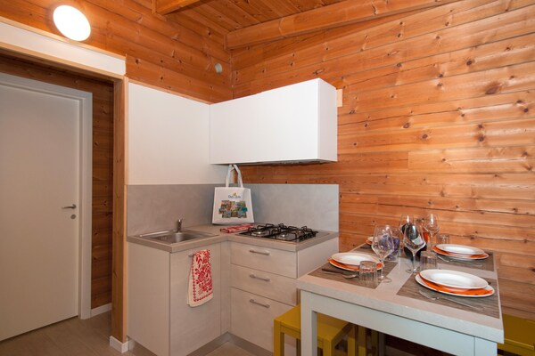 Foto van Bungalow in het Adriano Family Camping Village - Vakantiehuis in Punta Marina - Kitchen