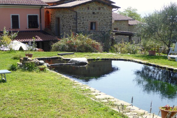 Foto van Vakantiehuis in Mulazzo met Natuurvijver - Vakantiehuis in Mulazzo - PoolOfHouse