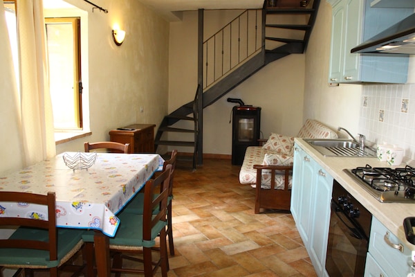 Foto van Vakantiehuis in Mulazzo met Natuurvijver - Vakantiehuis in Mulazzo - LivingRoom