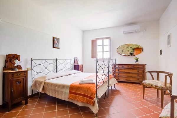 Foto van Appartement in Peccioli met zwembad - Vakantiehuis in Peccioli - BedRoom