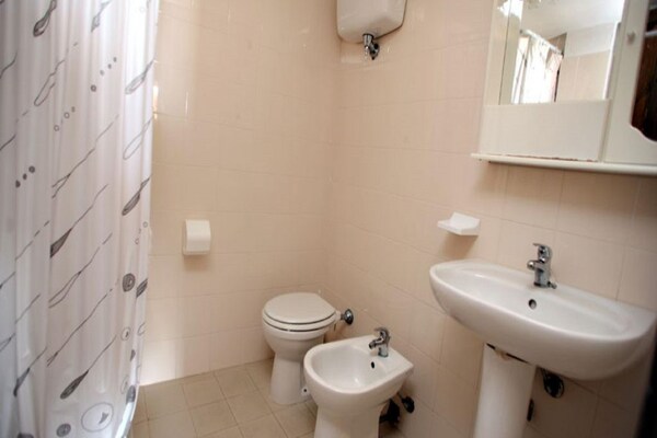 Foto van Heerlijk appartement in Sant'Irene-torre Vecchia met tuin - BathRoom