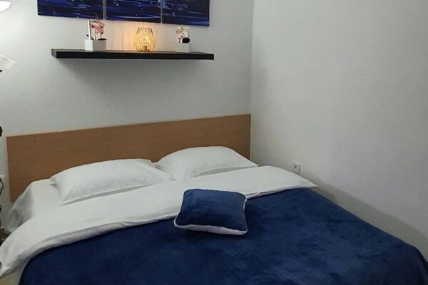 Foto van Comfort Accommodation Baošići Montenegro-One Bedroom Apartment with Terrace and Sea View (2) - BedRoom