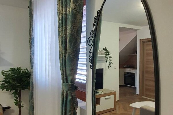 Foto van Comfort Accommodation Baošići Montenegro-One Bedroom Apartment with Terrace and Sea View (4) - LivingRoom