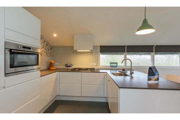 Foto van Appartement vlakbij het strand - Vakantiehuis in Vrouwenpolder - Kitchen