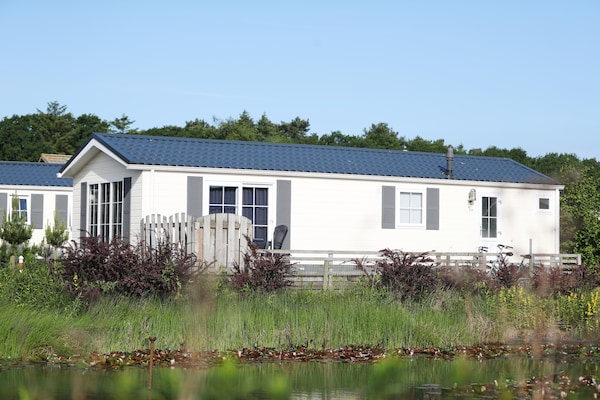 Foto van Charmant vakantiehuisje met sauna op het eiland Texel. - ExteriorSummer
