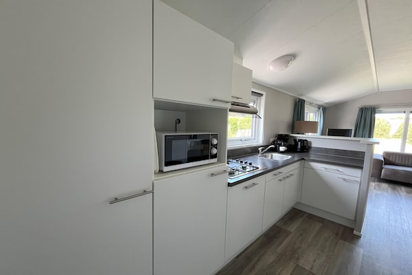 Foto van Charmant vakantiehuisje met sauna op het eiland Texel. - Kitchen