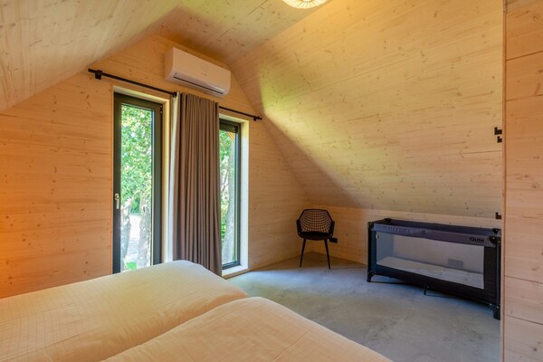 Foto van Luxe vakantiehuis aan zee - Vakantiehuis in Sint Maartenszee - BedRoom