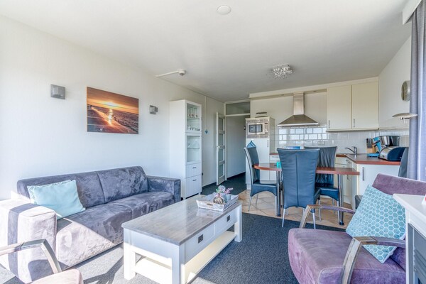 Foto van 4 Persoons appartement met eiland-zeezicht - Vakantiehuis in De Koog - LivingRoom