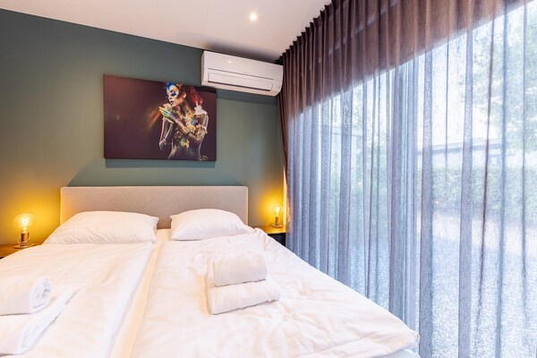 Foto van Modern chalet vlakbij het strand in Renesse - Vakantiehuis in Renesse - BedRoom