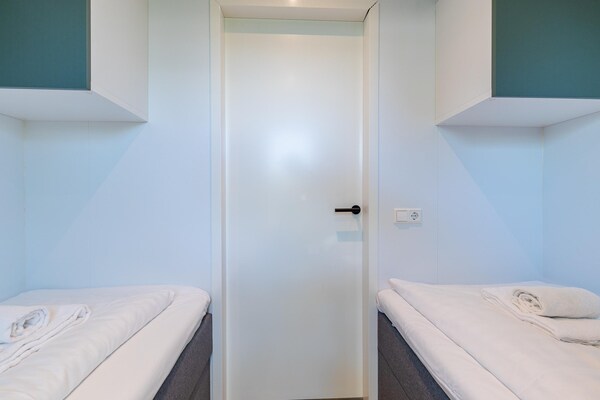 Foto van Modern chalet vlakbij het strand in Renesse - Vakantiehuis in Renesse - BedRoom