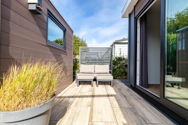 Foto van Modern chalet vlakbij het strand in Renesse - Vakantiehuis in Renesse - TerraceBalcony
