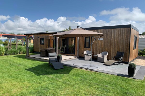 Foto van Chalet in Domburg bij de Duinen - Vakantiehuis in Koudekerke - ExteriorSummer