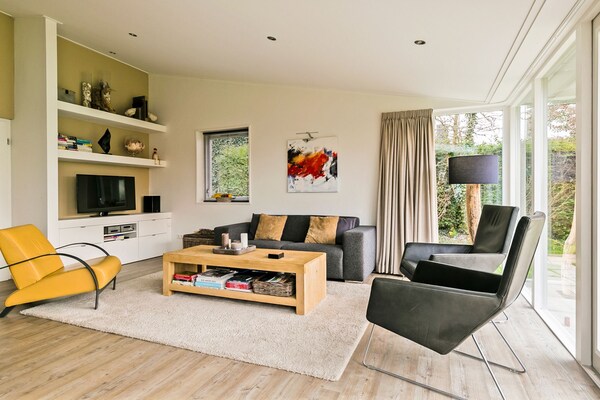 Foto van Villa bij Veerse Meer met Tuinzicht - Vakantiehuis in Kamperland - LivingRoom