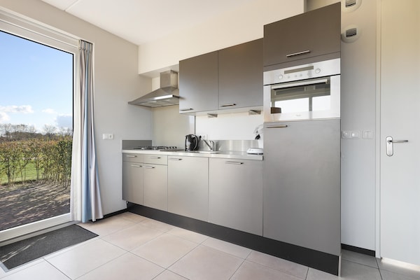 Foto van Verblijf aan het water vlakbij het strand - Vakantiehuis in Nieuwvliet - Kitchen