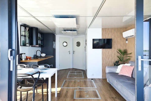 Foto van Woonboot in Łazy bij Jamno-meer en zee - Vakantiehuis in Łazy - LivingRoom