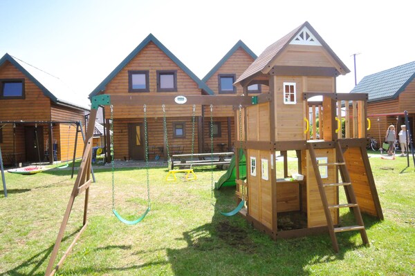 Foto van Rijtjeshuis in Rewal bij Zandstrand - Vakantiehuis in Rewal - ExteriorSummer