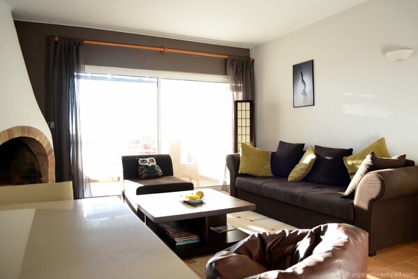 Foto van Appartement met zeezicht op loopafstand van strand - LivingRoom