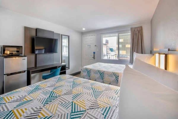 Foto van 2 tweepersoonsbedden | Suite, keuken - Vakantiehuis in Eureka - BedRoom