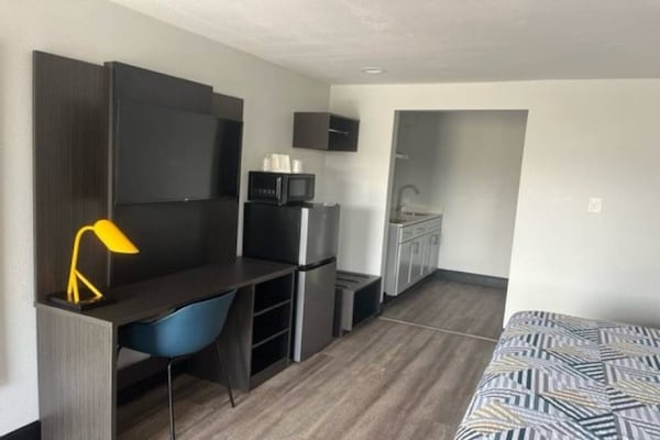 Foto van 2 tweepersoonsbedden | Suite, keuken - Vakantiehuis in Eureka - BedRoom